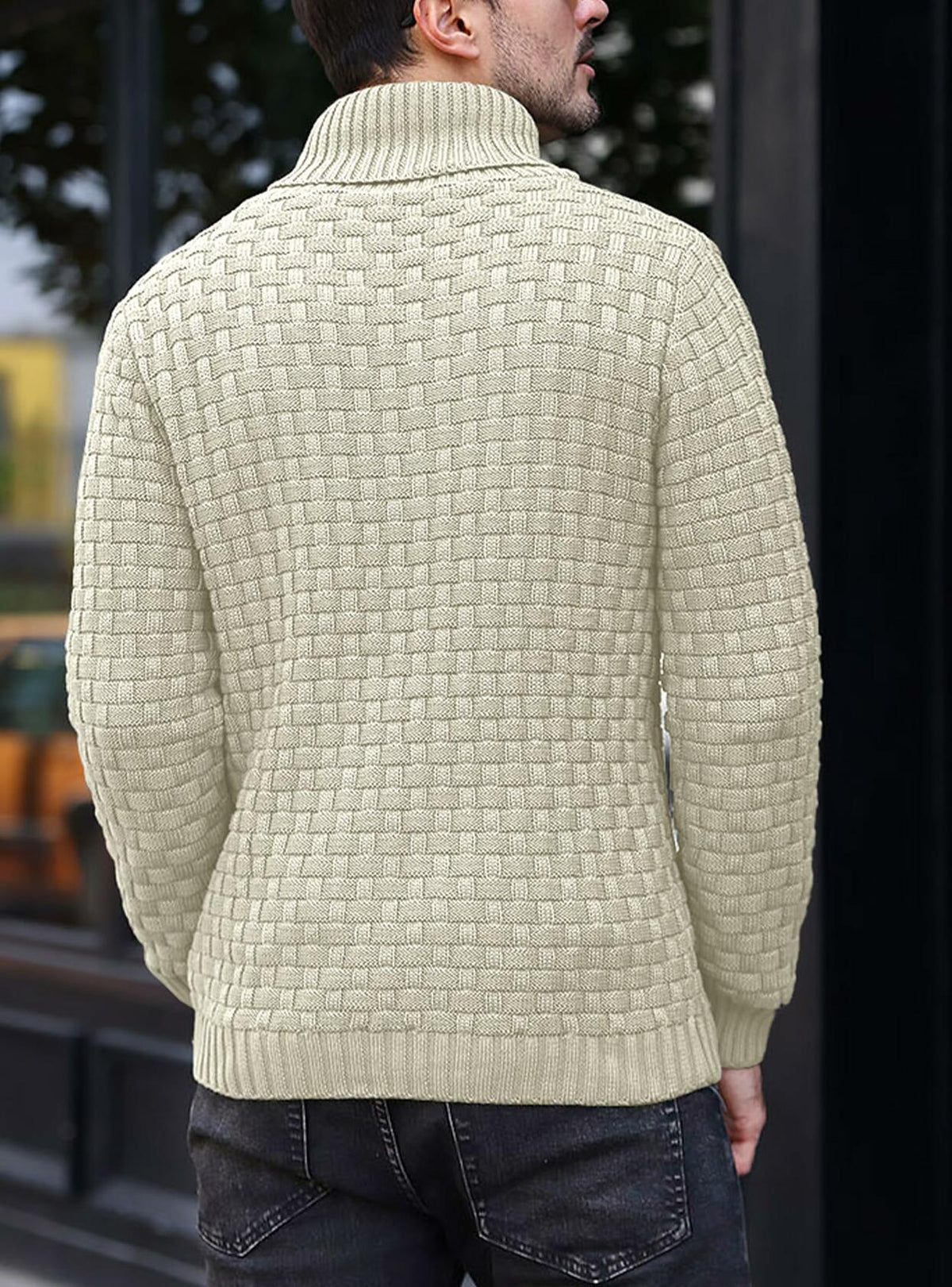 Cream cable-knit pullover sweater, back view with ribbed collar and cuffs