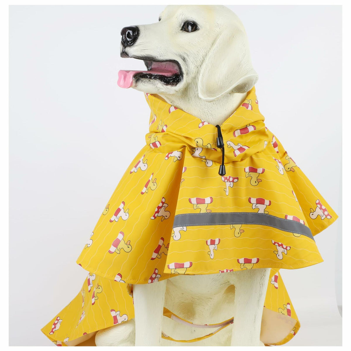 Yellow hooded dog raincoat poncho with cartoon print and reflective trim
