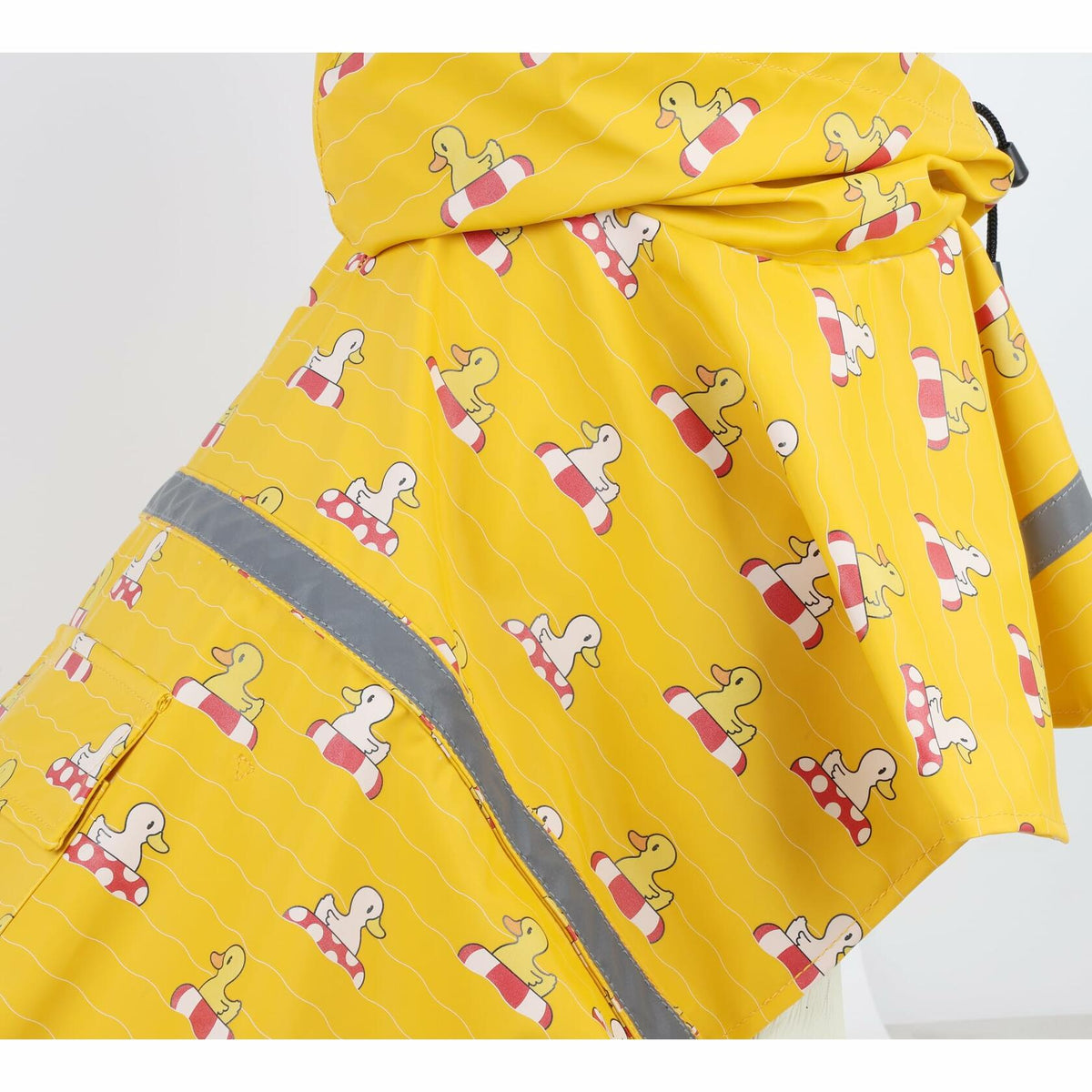 Yellow raincoat poncho fabric with cartoon print and gray reflective stripe