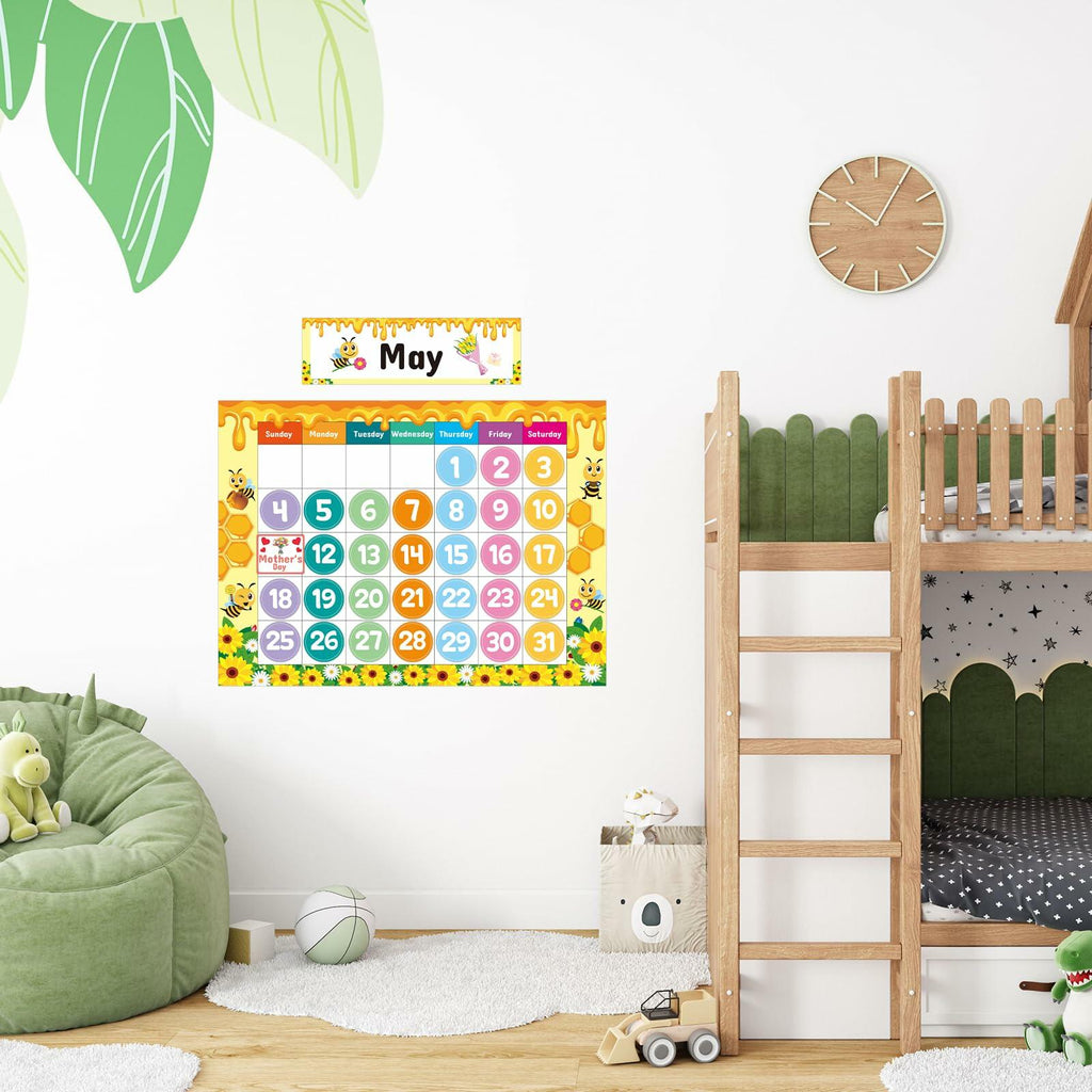 Classroom calendar kit on wall with May chart and days-of-week and weather cards