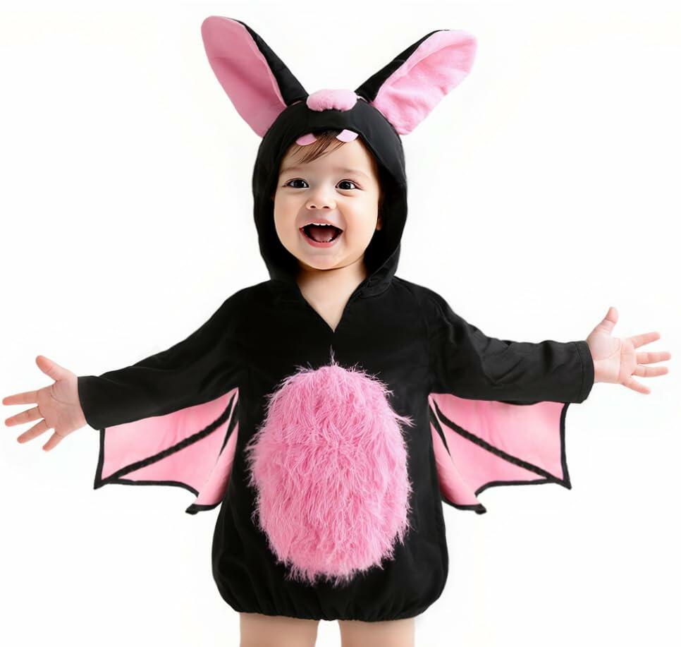 Black hooded bat plush onesie with pink wing panels and fuzzy pink belly