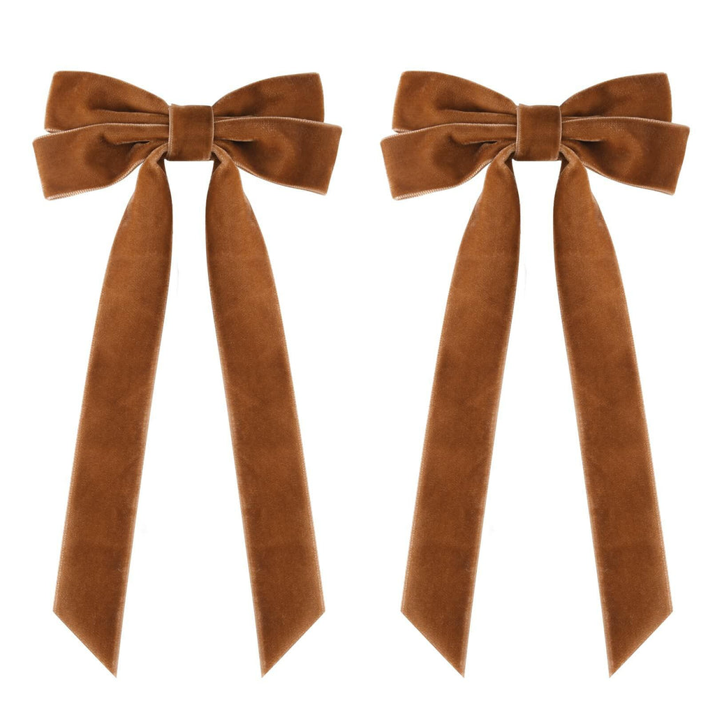 Two brown velvet bow alligator clips with long ribbon tails