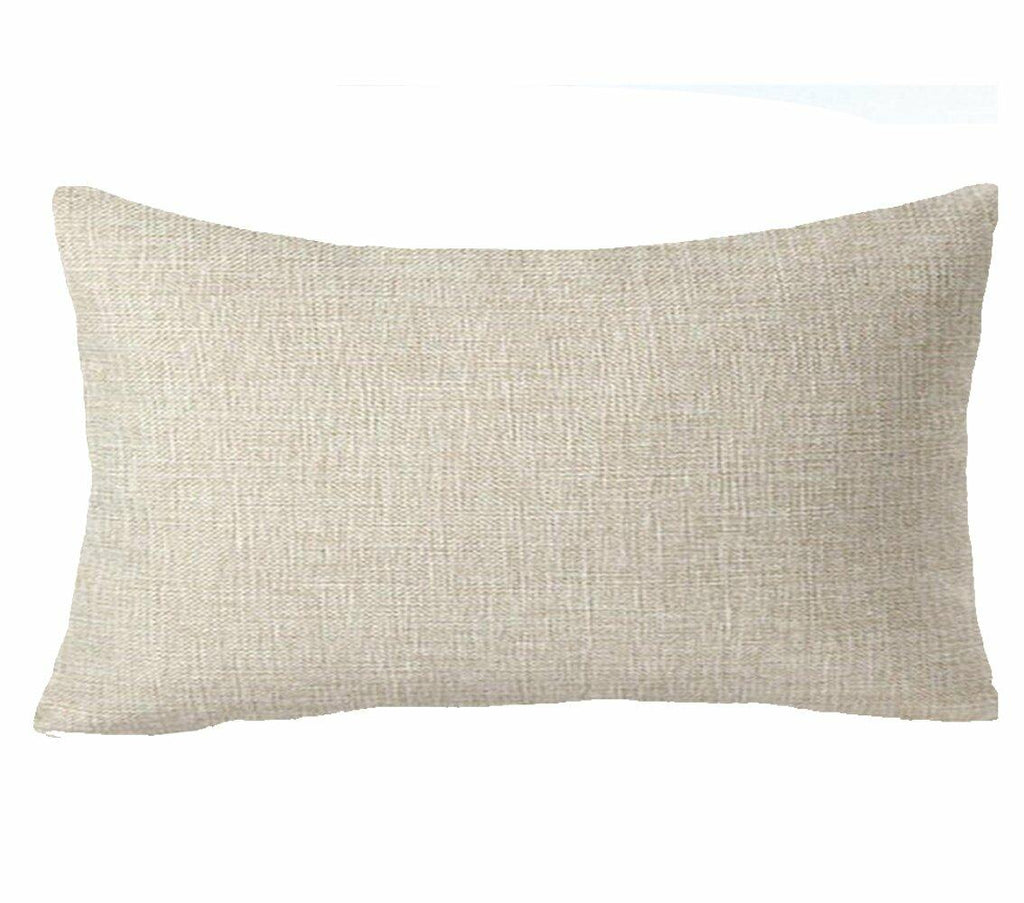Solid beige lumbar pillow cover with textured woven fabric