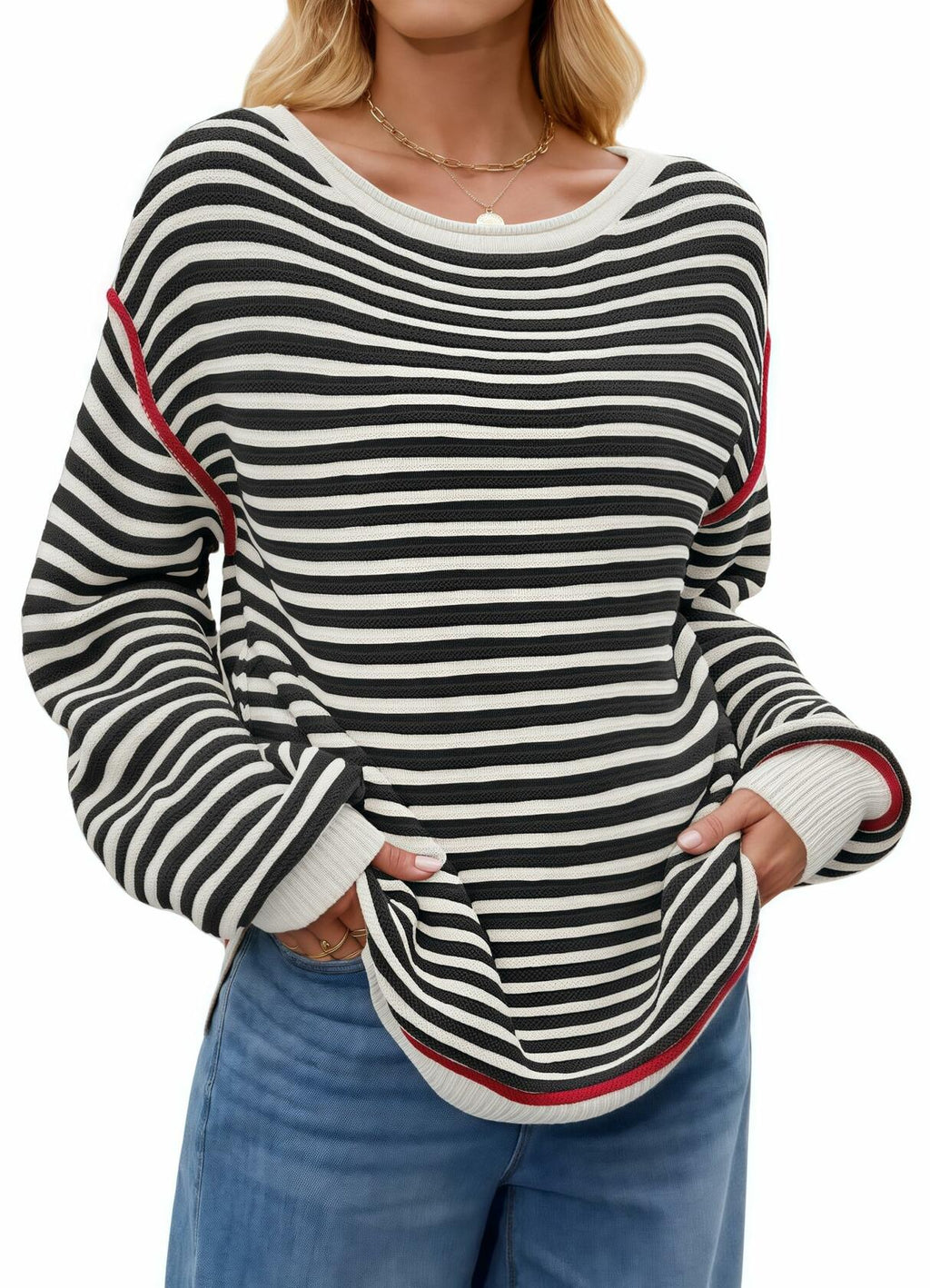 Black-and-white striped oversized boat-neck sweater with red-trim cuffs and hem