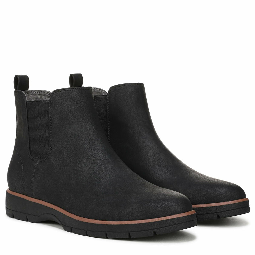 Pair of black ankle boots with elastic side panels and low rugged tread soles