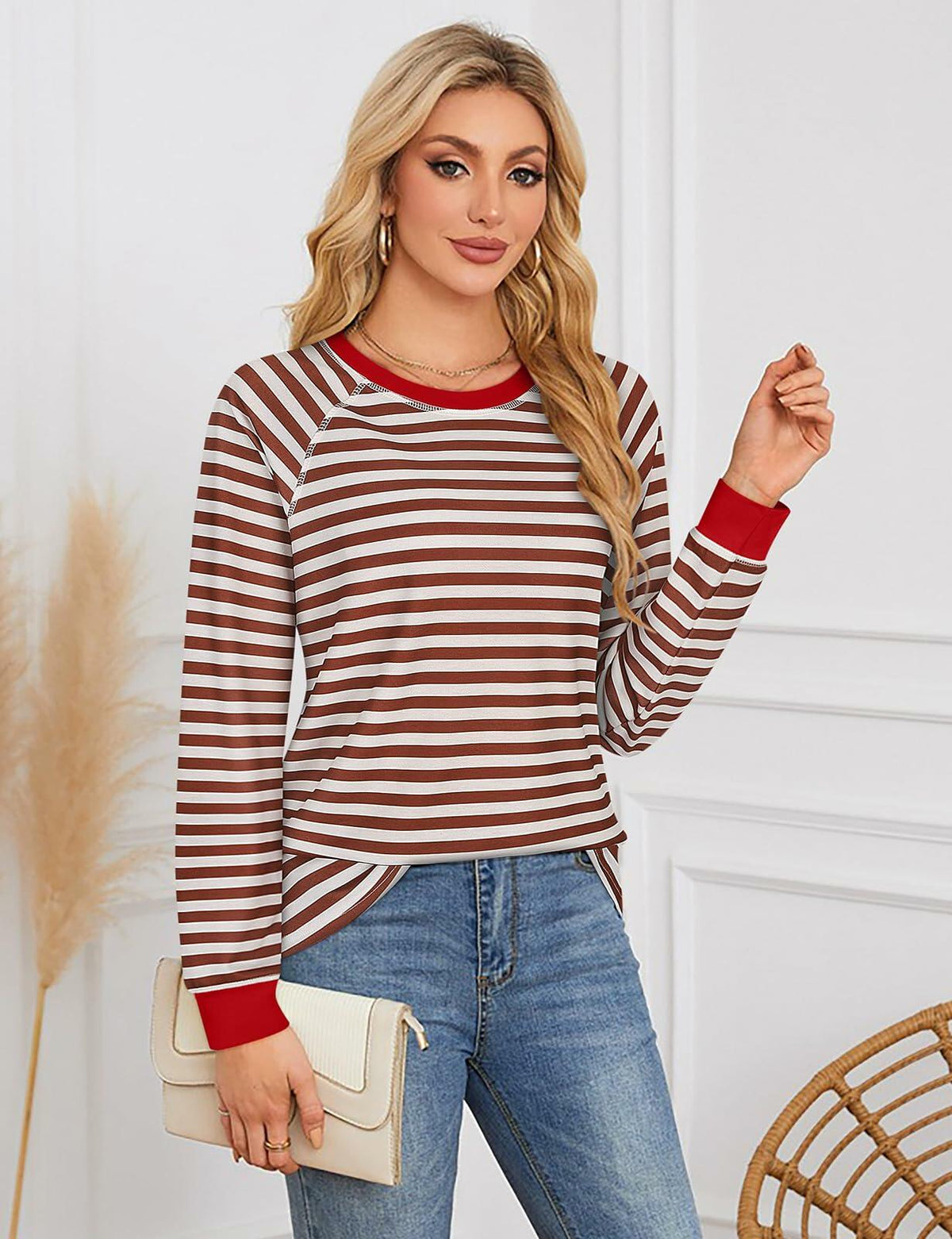 Striped color-block sweatshirt with long sleeves, maroon tan stripes and red cuffs