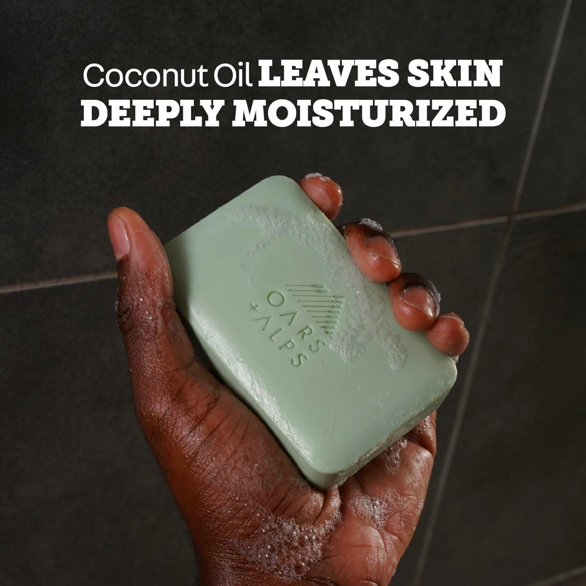 Oars + Alps Epsom Salt bar soap, mint-green bar held in hands