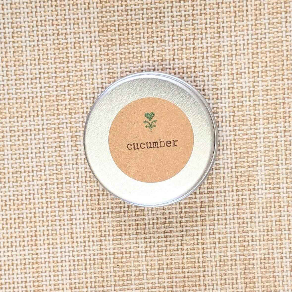Round seed tin with beige label reading cucumber