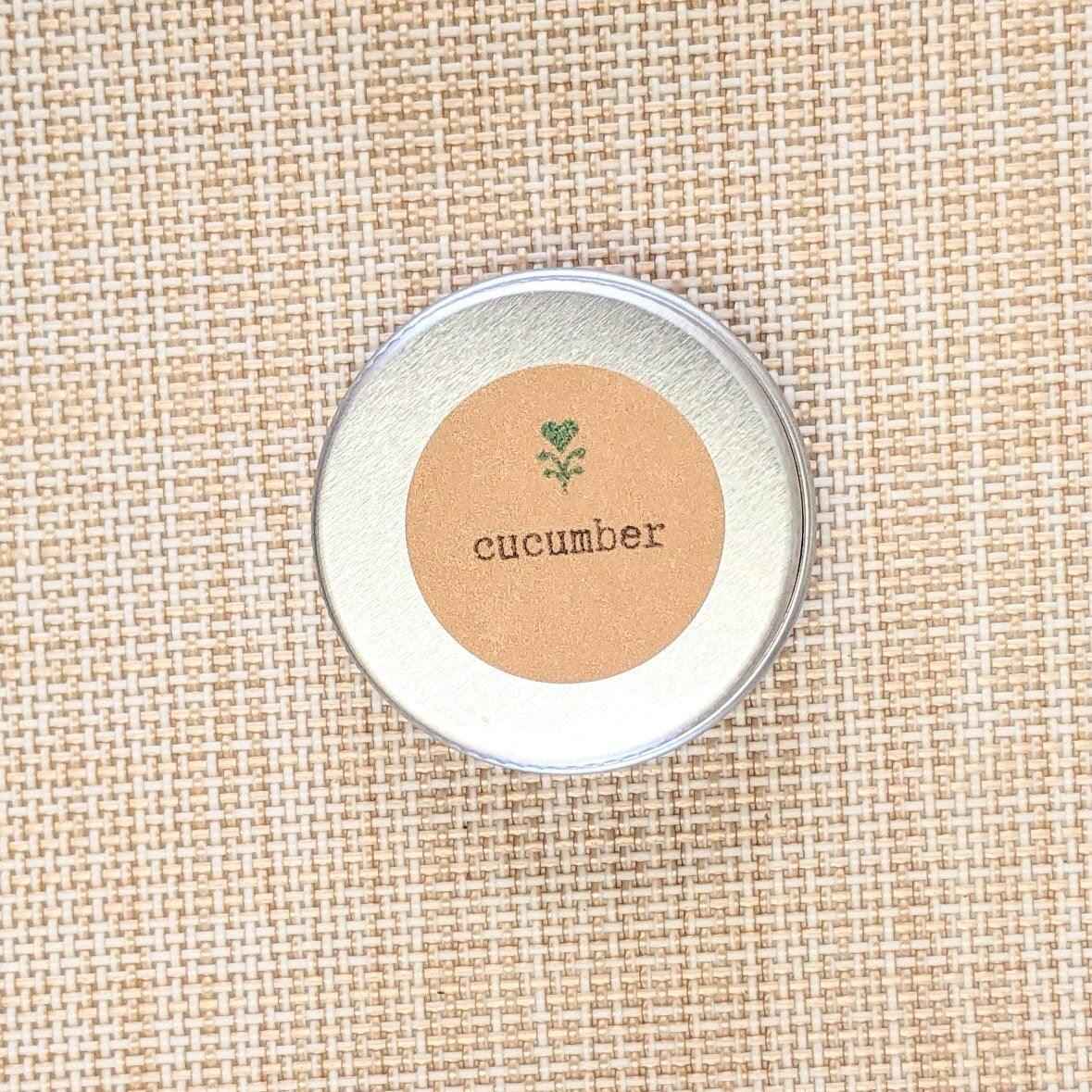 Round seed tin with beige label reading cucumber
