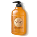 Orange honey bath and shower cream bottle with black pump dispenser