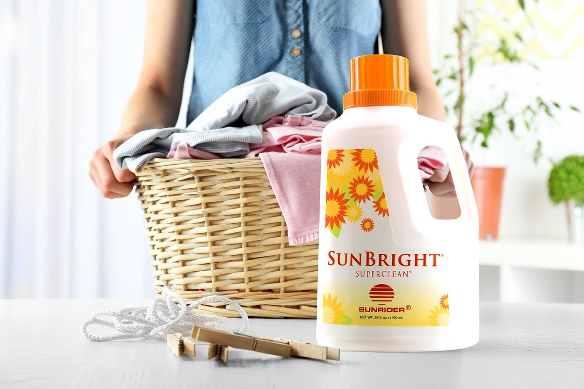 Sunrider SunBright SuperClean cleaner bottle with orange cap and flower label