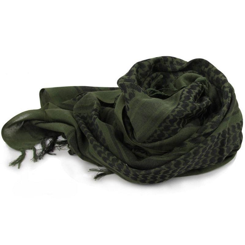 Dark green keffiyeh-style cotton scarf with geometric pattern and tassel fringe