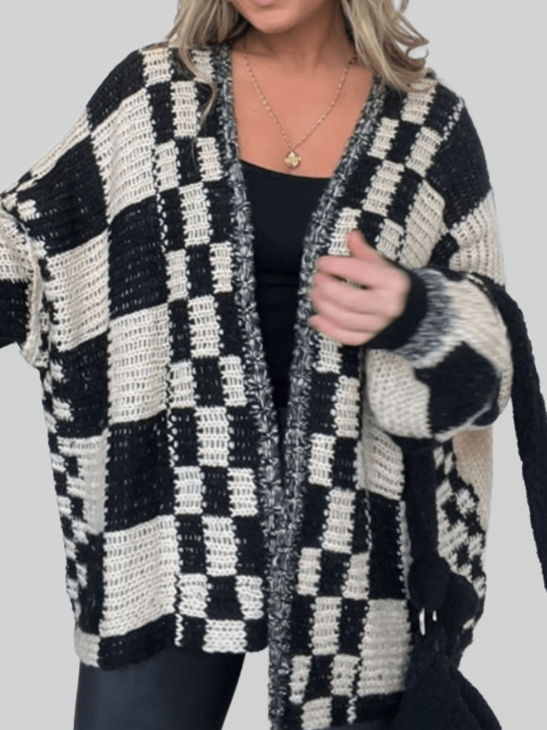 Women’s plaid open-front cardigan sweater with long sleeves, black and cream
