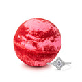 Red speckled bath bomb with silver ring featuring square stones