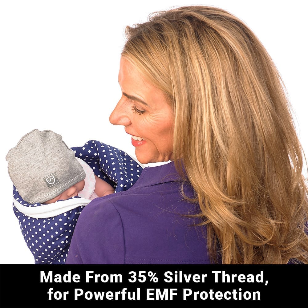 Gray baby beanie with stitched shield emblem, worn on infant