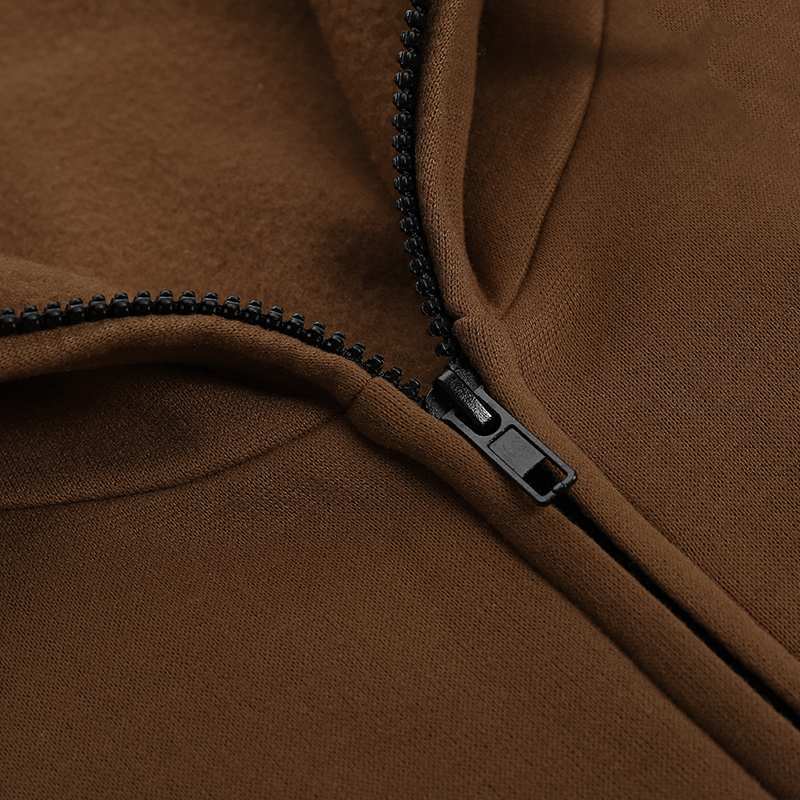 Brown hooded zip-up maxi dress, close-up of zipper and stitched trim