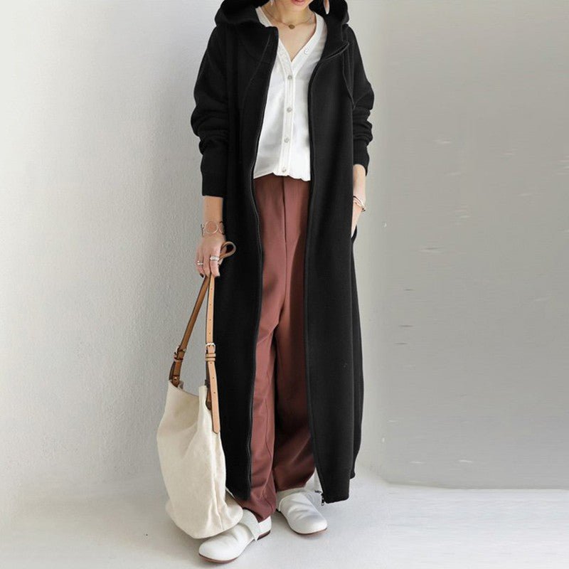 Black zip-up maxi robe dress with hood and open front zipper over a white top