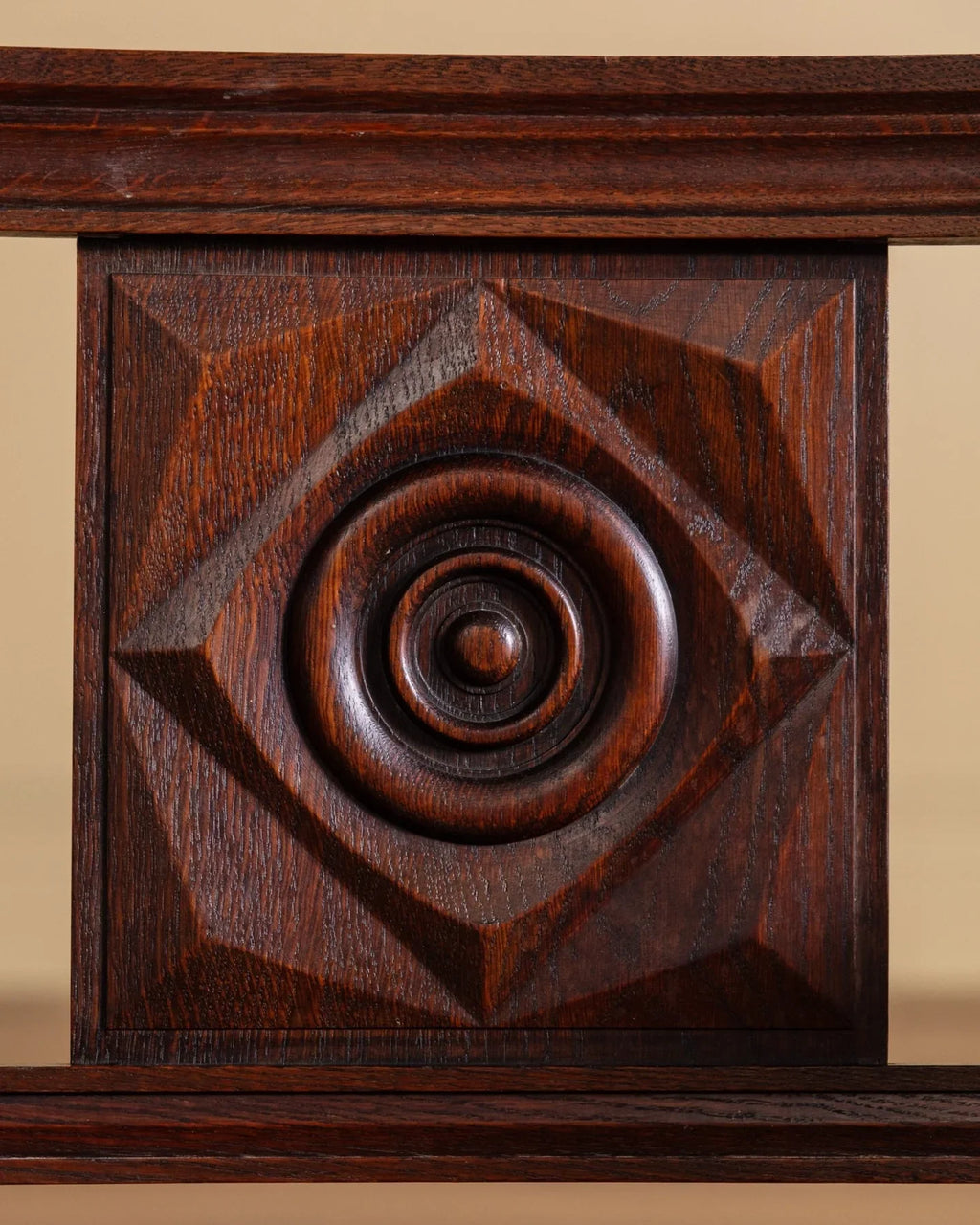 Wood chair backrest panel with circular rosette carving and geometric diamond motif