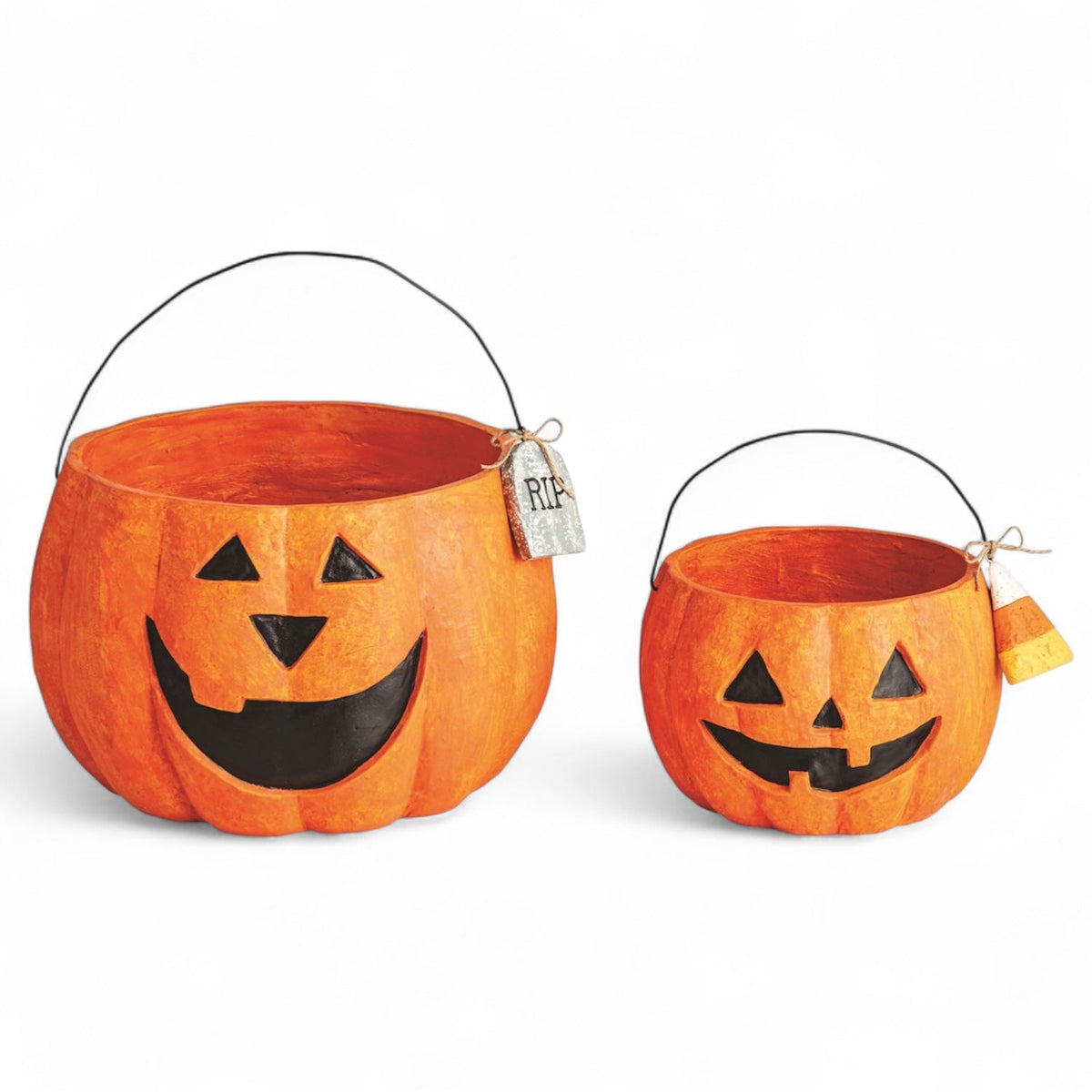 Orange paper mache jack-o'-lantern treat bucket with smiling face and loop handle
