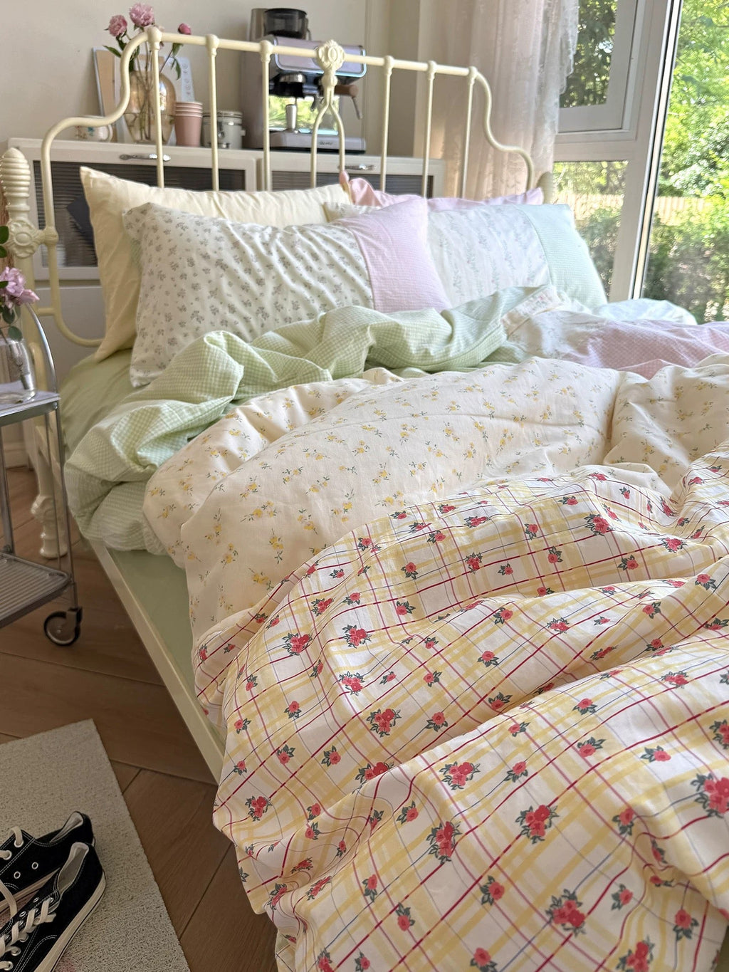 Pastel floral duvet cover set featuring cream, mint green, and pink patterned fabric