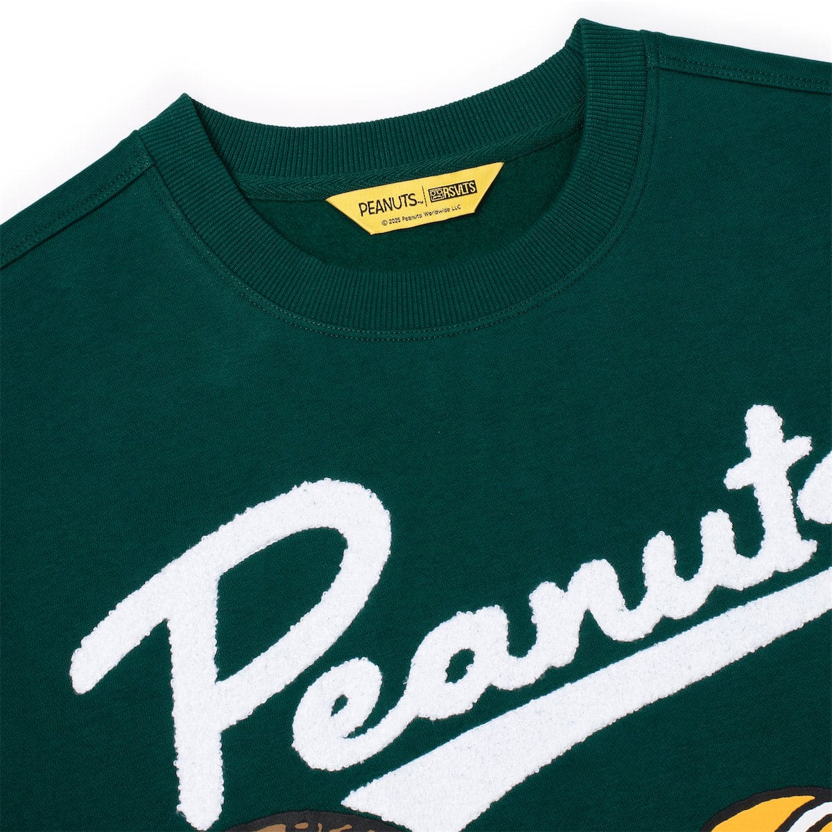 Green crewneck sweatshirt with ribbed crew neck and large Peanuts wordmark print