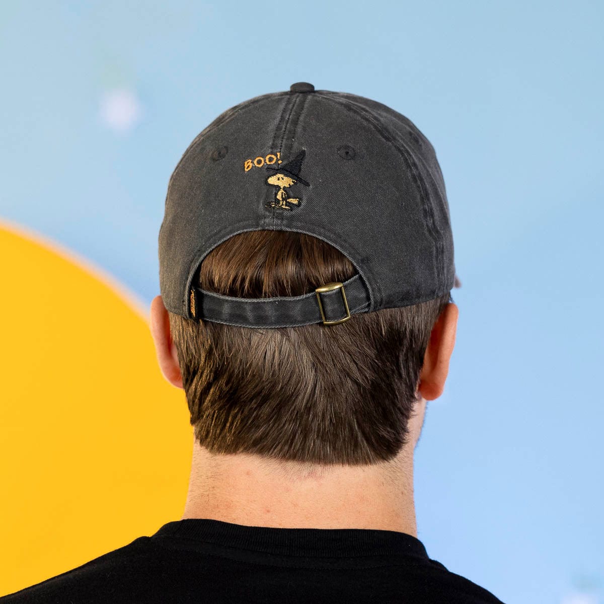 Charcoal dad hat back view with “BOO!” text and Snoopy patch