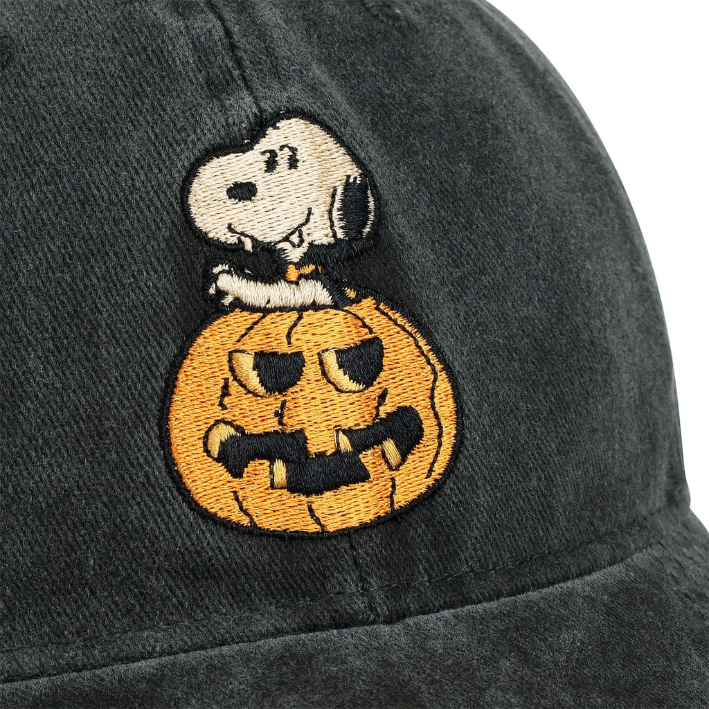 Charcoal dad hat close-up: Snoopy on jack-o-lantern embroidered patch