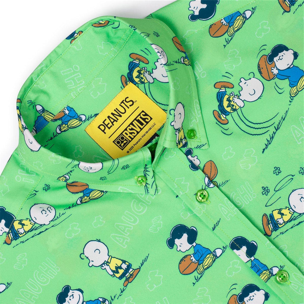 Green short-sleeve shirt with Peanuts characters and yellow collar label