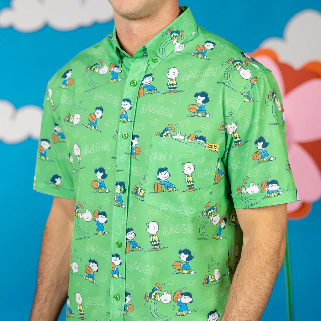 Green short-sleeve button-up shirt with Peanuts characters and front placket detail