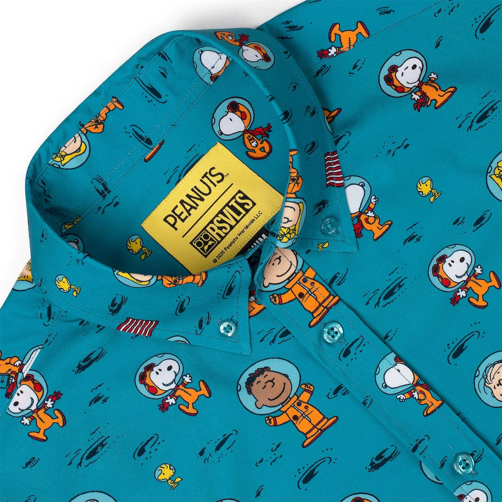 Close-up of teal Peanuts-print collar with neck label and button detail