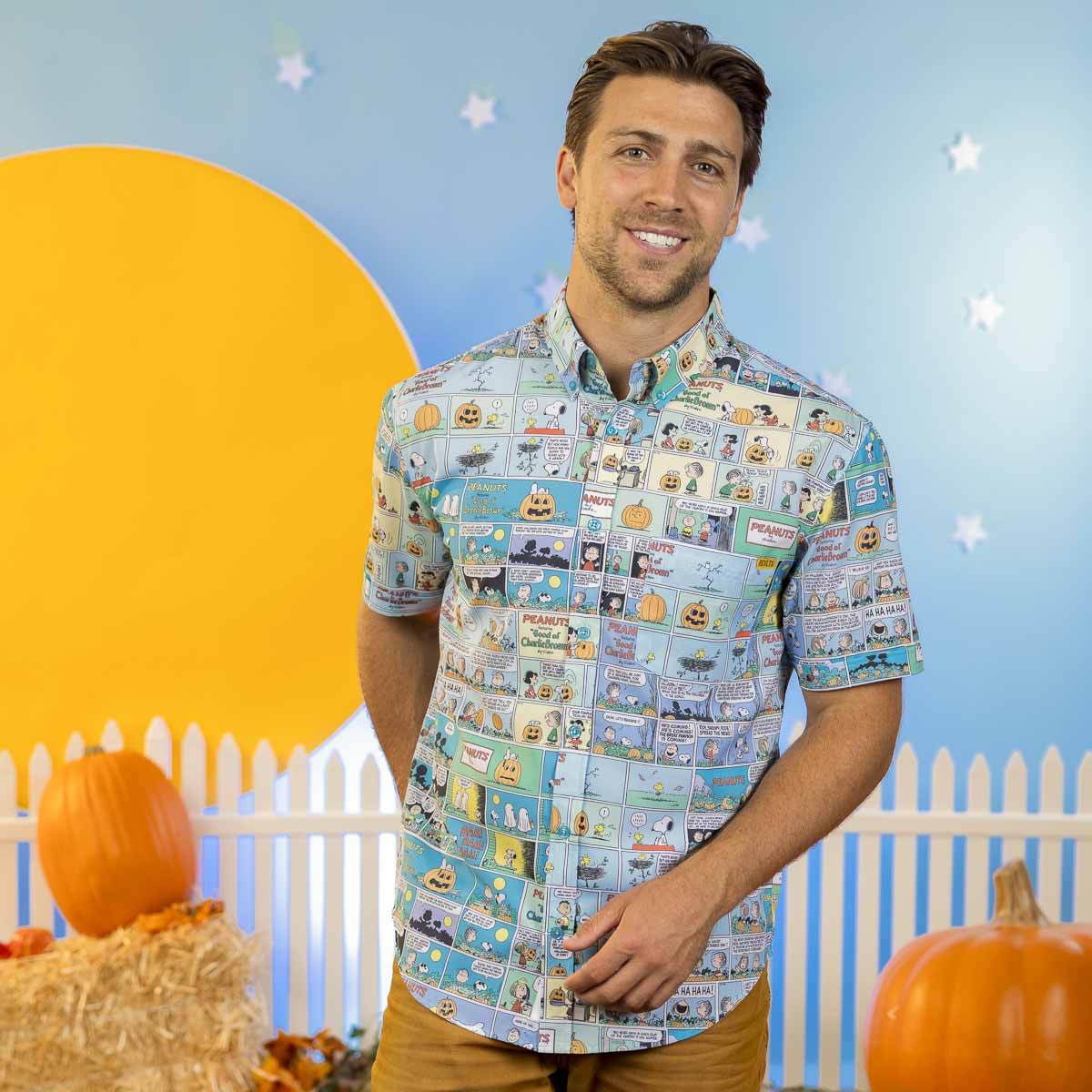 Light blue short sleeve button-up shirt with Peanuts comic strip Halloween theme