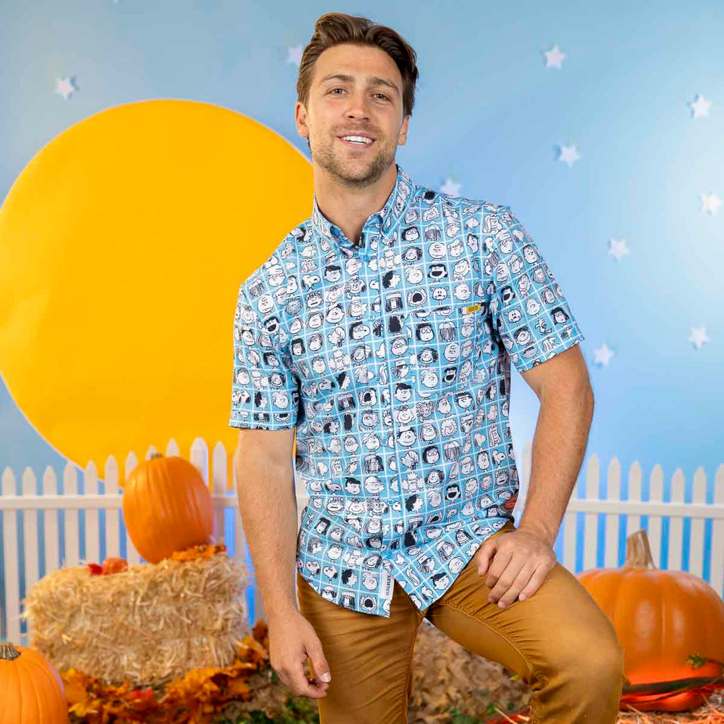 Peanuts printed short-sleeve collared shirt in blue, worn by model