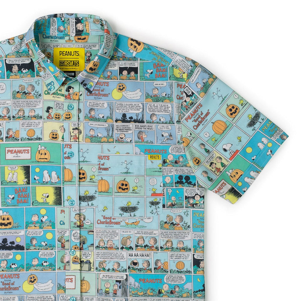 Light blue short sleeve shirt with Peanuts comic strip pattern and pumpkins