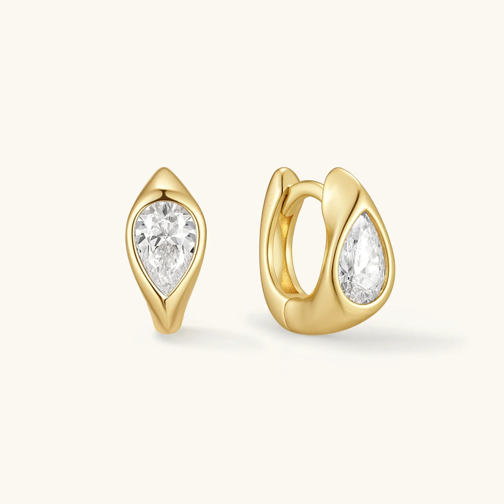 Gold wavy hoop earrings with teardrop settings and clear round stones