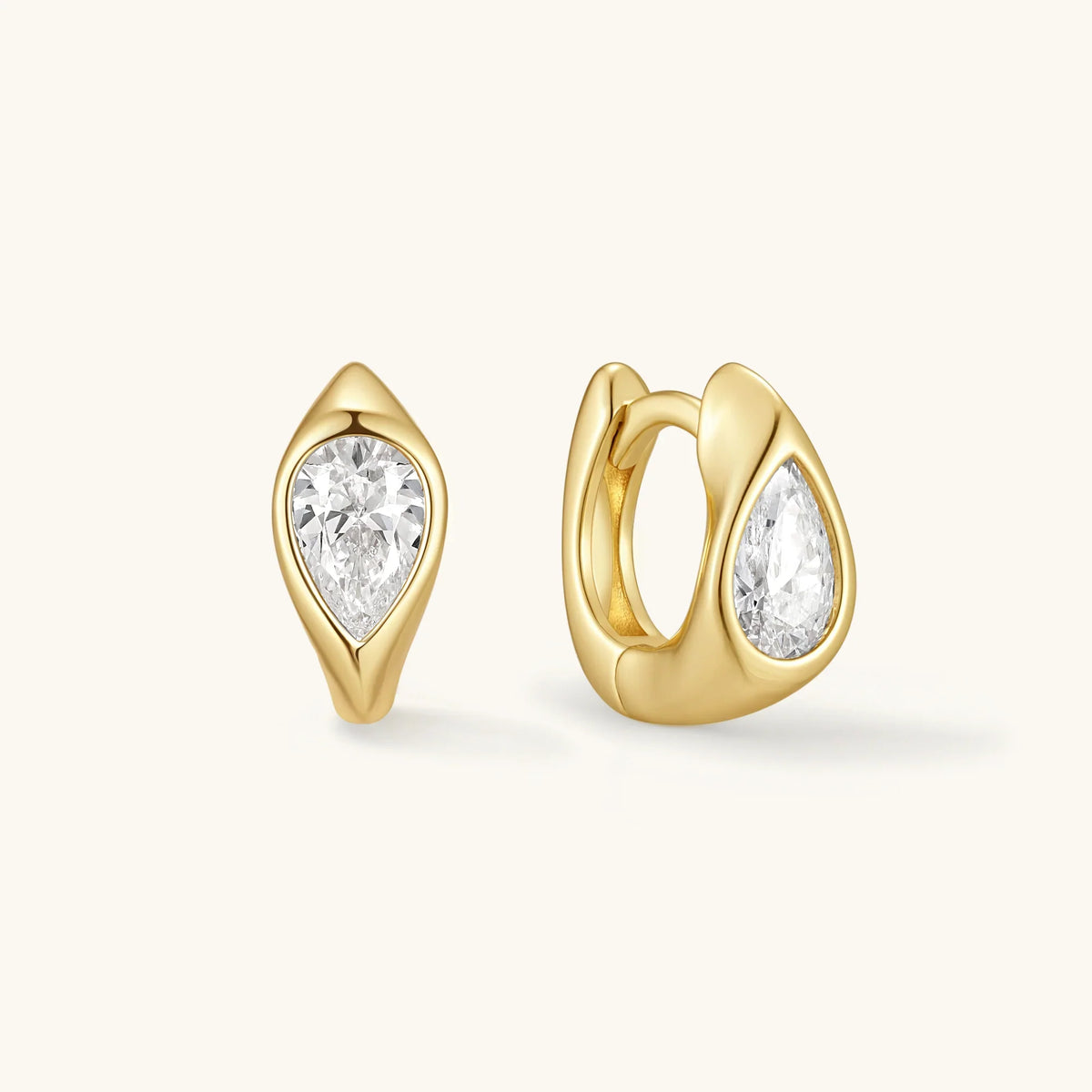Gold wavy hoop earrings with teardrop settings and clear round stones