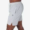 Ash gray performance training shorts with drawstring waist and side slits