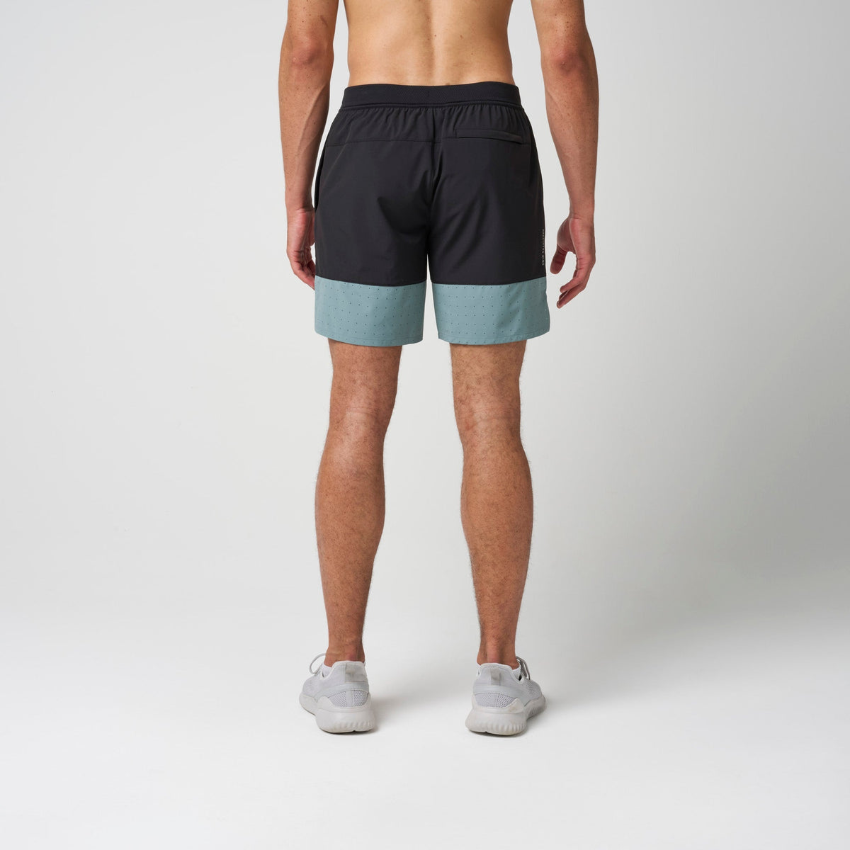 Performance training shorts, black top with steel blue lower and elastic back waistband