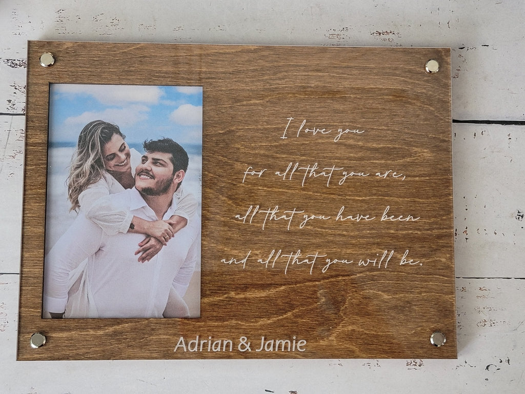 Walnut engraved picture frame with couple photo and cursive message with name Adrian & Jamie