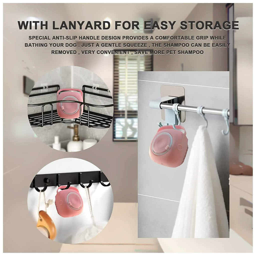 Pink pet bath brush with lanyard storage hook on a shower rail