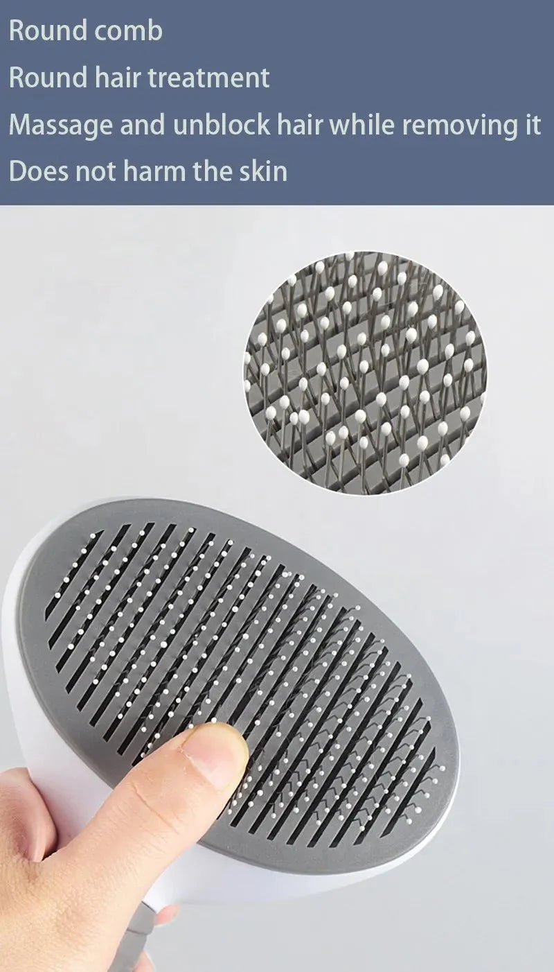 Gray pet slicker grooming brush with round comb head and metal pins, close-up