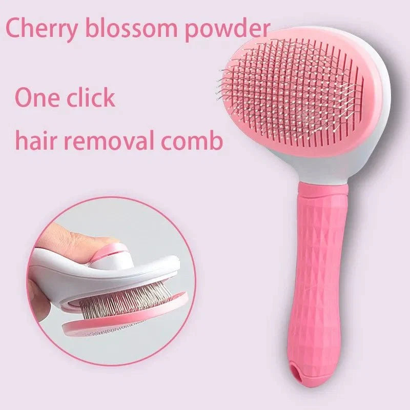 Pet hair removal comb brush with pink pin pad and pink handle.