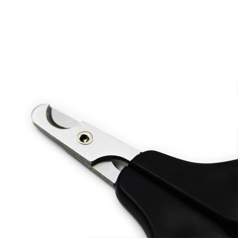Close-up of the curved metal cutting blade and black handle of a pet nail clipper