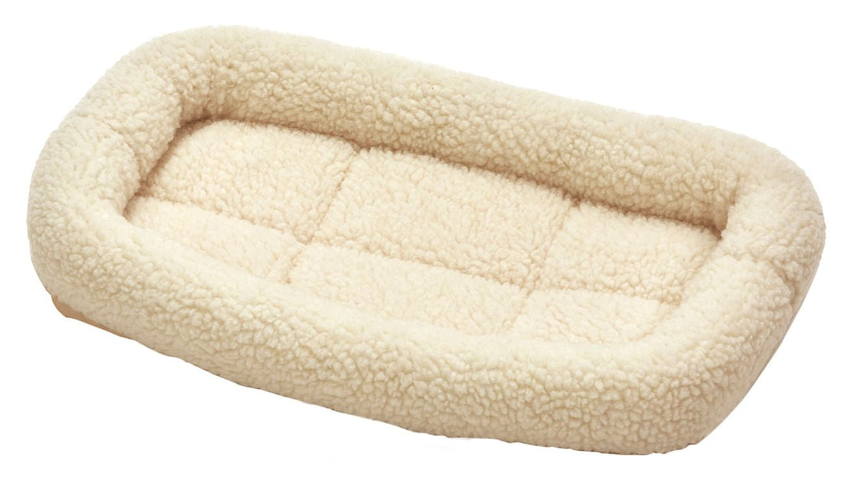 Cream plush fleece pet bed with raised bolsters, rectangular design