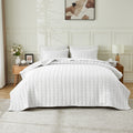Gauze quilt set with wave-stitch texture, white quilt and matching pillow shams