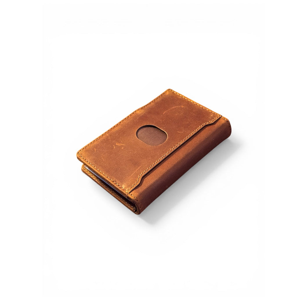 Cognac brown leather bifold wallet with oval card slot and top stitching