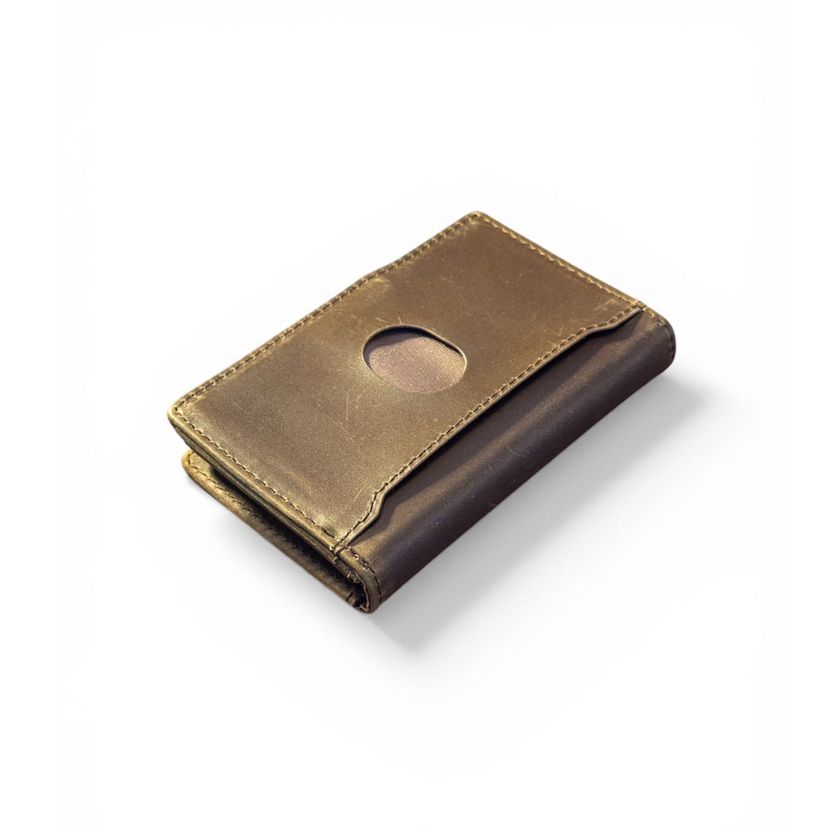 Tan leather bifold wallet with oval card slot and dark edge trim