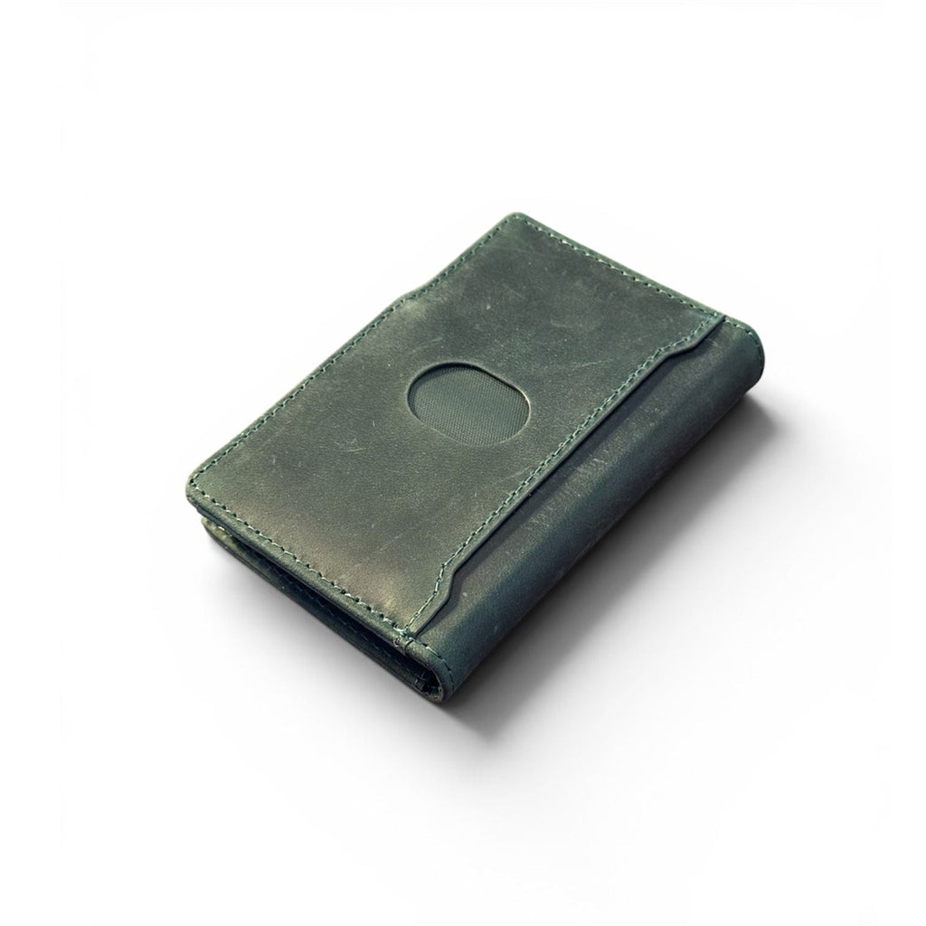 Dark green leather bifold wallet with oval card slot and neatly stitched seam