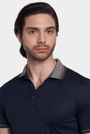 Navy cotton polo with striped contrast collar and short sleeves, close-up