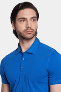 Royal blue mercerized cotton polo shirt, collared neckline with button placket.