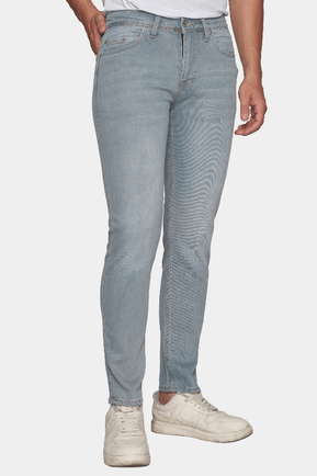 Light blue stonewash slim jeans with zipper fly and front pockets